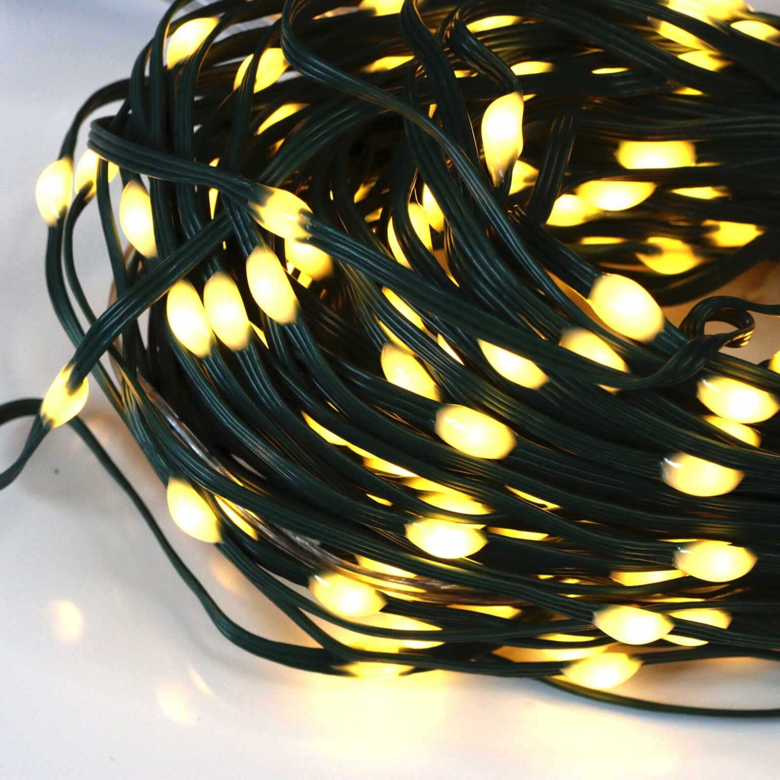 200 Warm White LED Fairy Lights on Green Wire. Multifunction, Remote